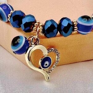 Deep Blue Glass Beads, Gold Heart Charm with Keen Eye Design Bracelet